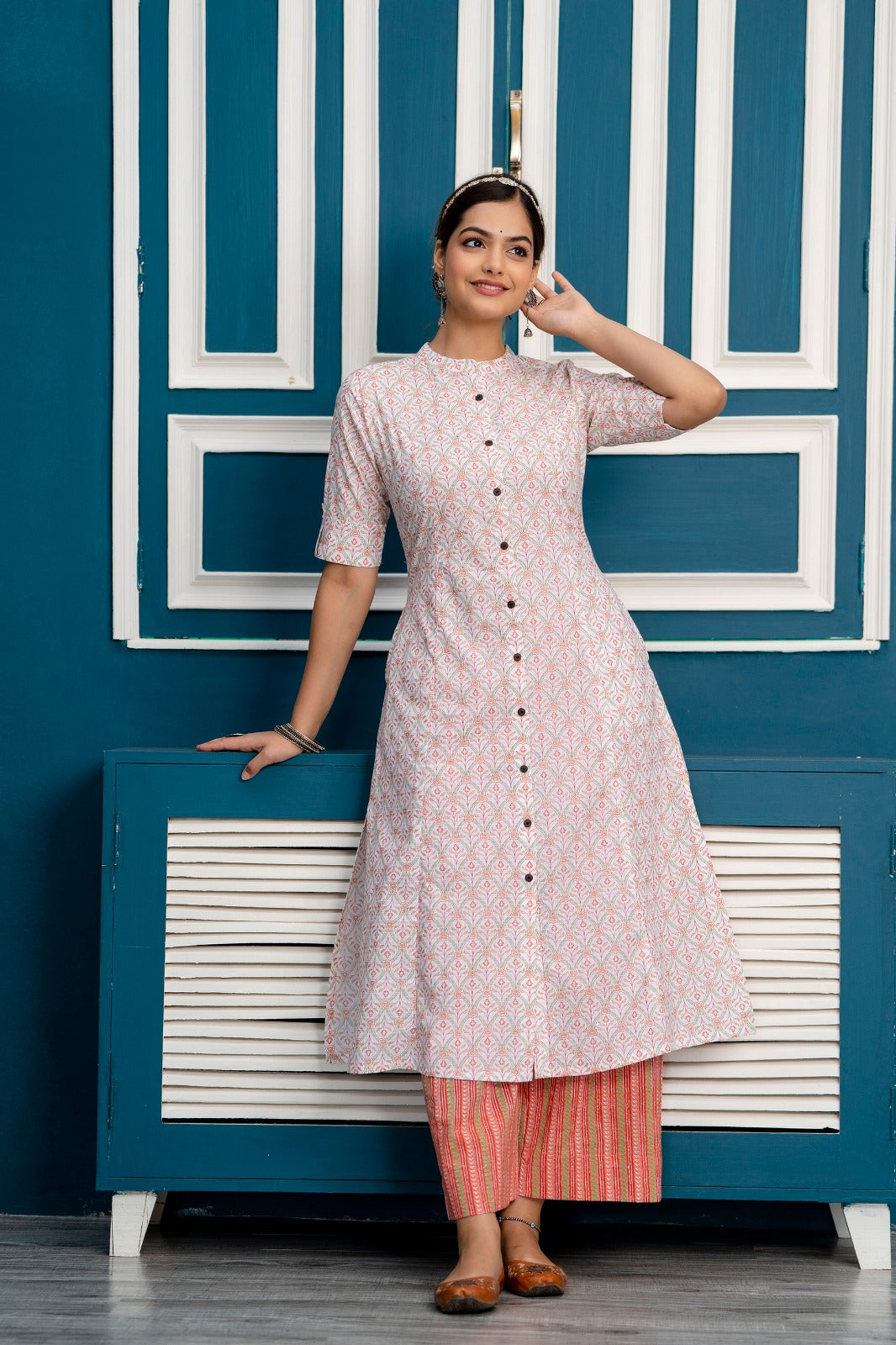 Pure Comfort: White Kurta and Orange Pant Suit